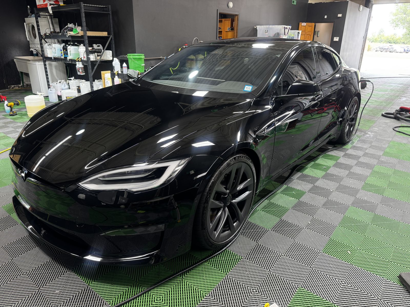 Black 2022 Tesla Model S after machine polish and paint sealant, Woodstock IL customer